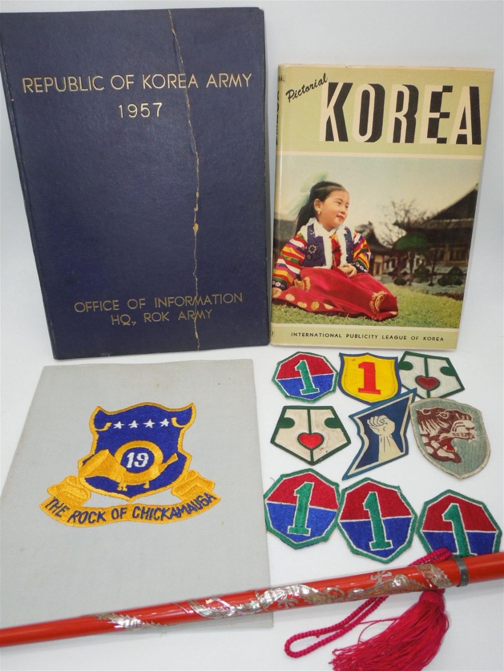 Lot 359: 1950s Korean Military Patches, Books, & US Colonel South Korean Swagger Stick