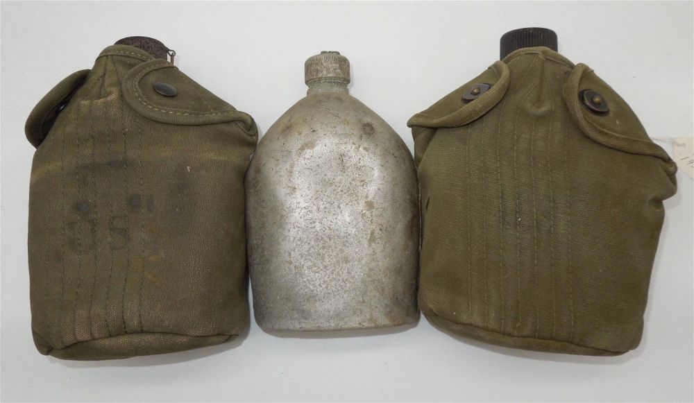 Lot 226: (2) US Military Korean War Canteens & Covers Lot