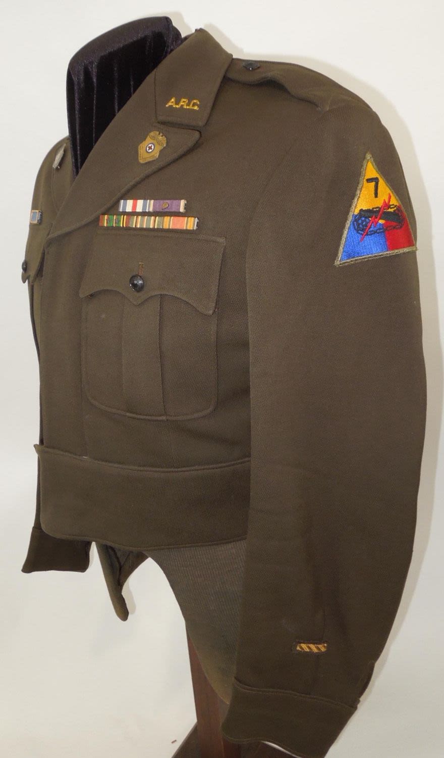 Lot 302: WWII Tank Destroyer & 7th Armored Silver Star Red Cross Uniform