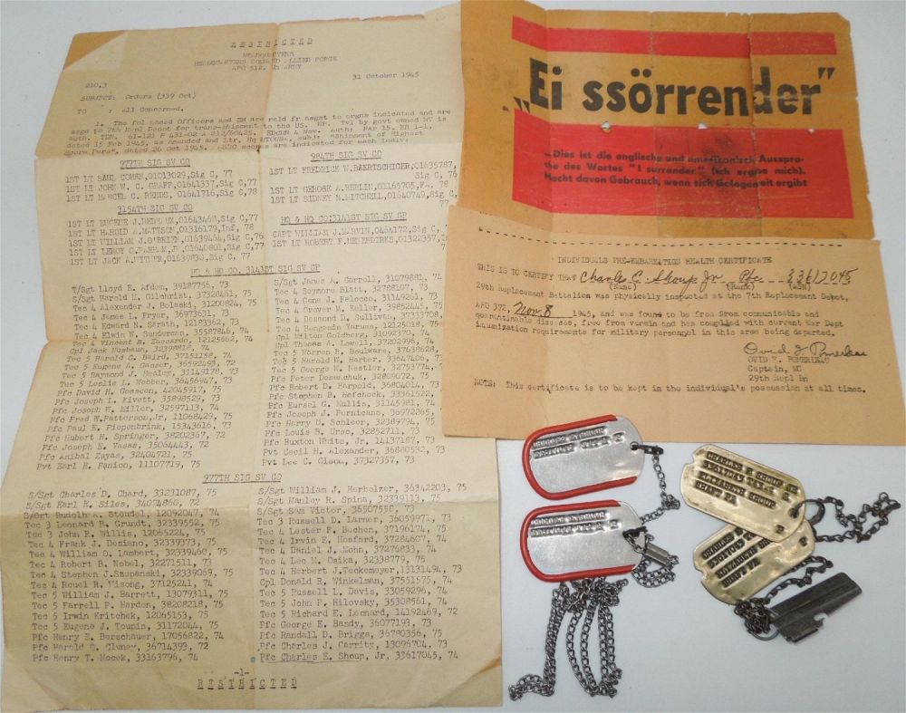 Lot 318: WWII 977th Signal Service Co. Dog Tags, Papers, & Surrender Leaflet