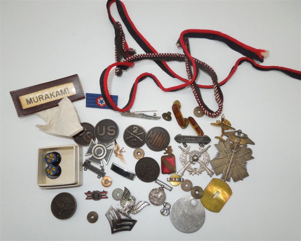 Lot 334: Misc. WWI - Vietnam US, British, Japanese Pins & Insignia Lot