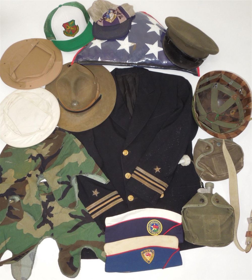 Lot 135: WWII - Vietnam Uniform Hats Helmet Liner Canteens