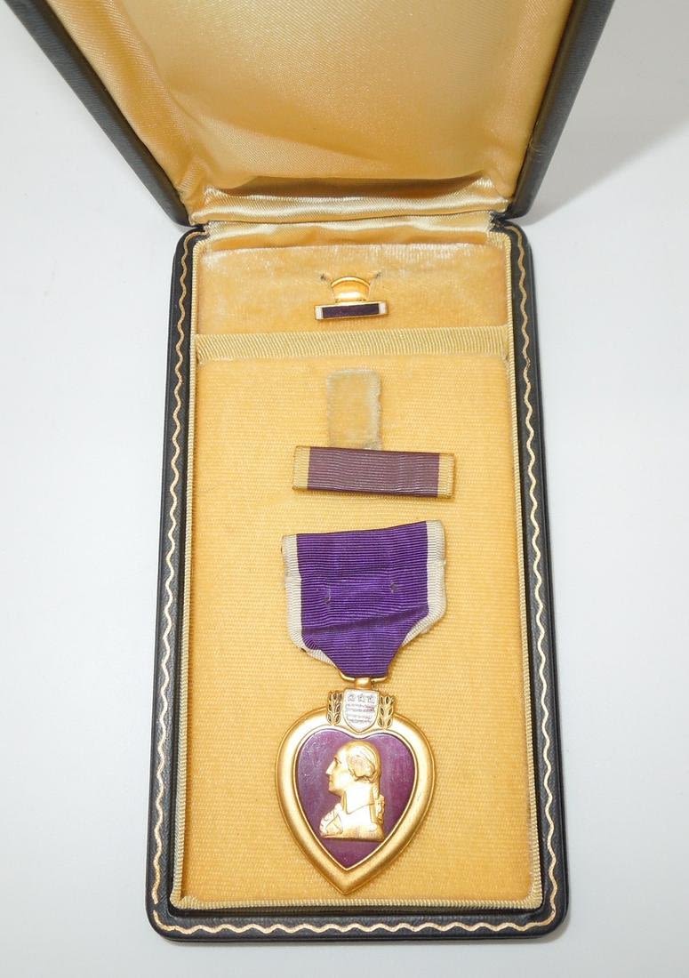 Lot 210: WWII US Army & AAF Slot Brooch Numbered Purple Heart & Case