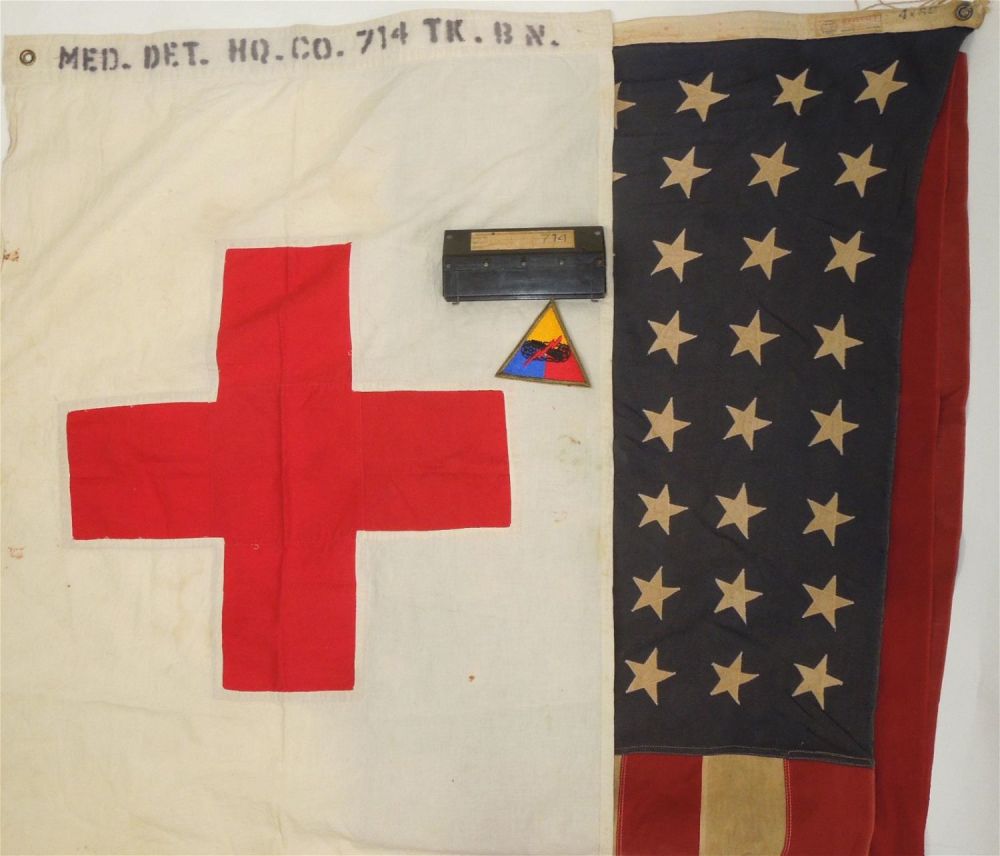 Lot 216: WWII 12th Armored Division 714th Tank Battalion Medic & US Flag Group