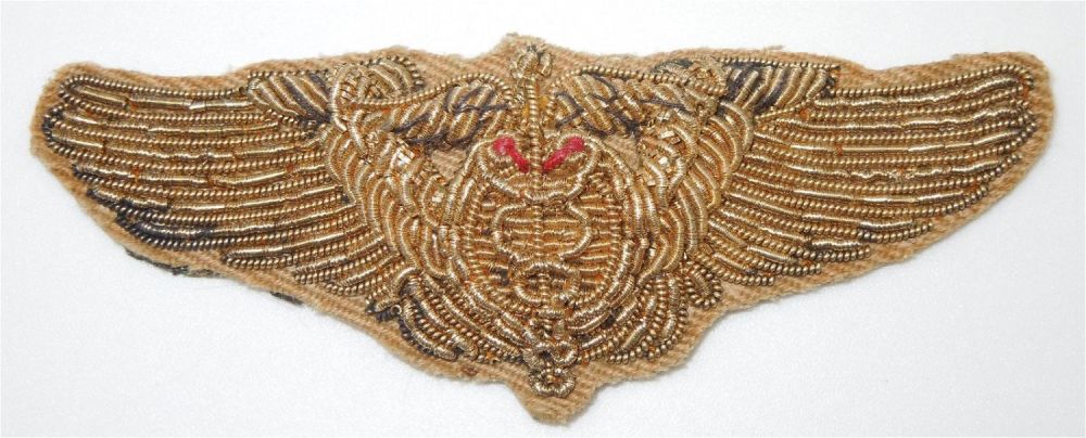 Lot 385: WWII China CBI Bullion Flight Surgeon Wings Patch