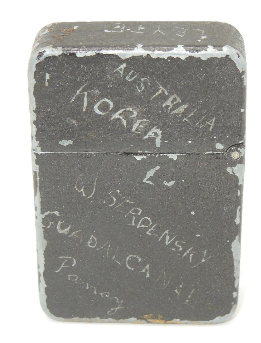 Lot 389: WWII USMC Guadalcanal Named & Engraved Crackle Lighter