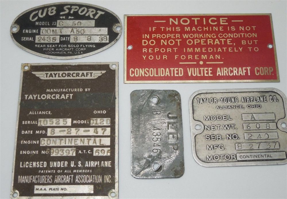 Lot 459: WWII US Military Equipment Data Plates Jeep Vultee Taylor Young Cub Scout Lot