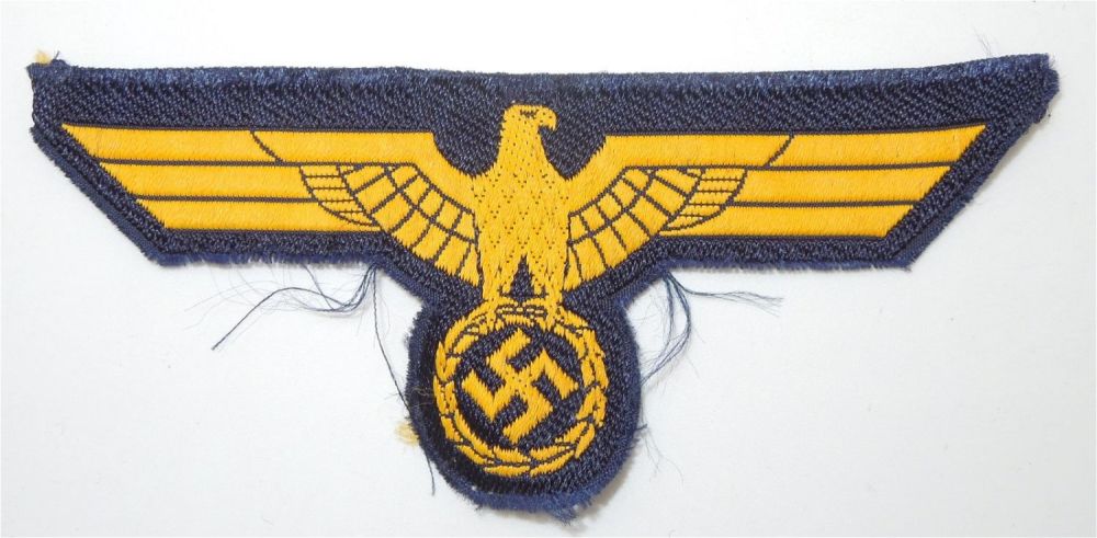 Lot 205: WWII German Kriegsmarine Breast Eagle Cloth Patch in BeVo