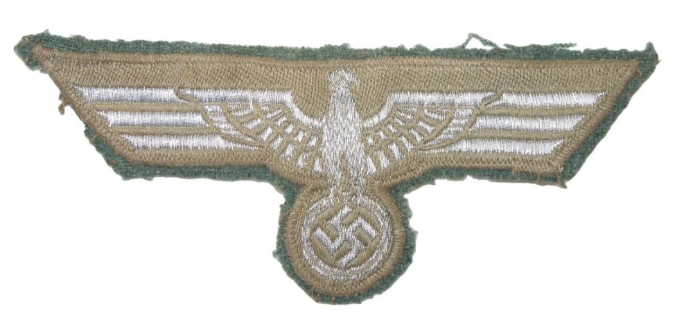 Lot 208: WWII German Wehrmacht Cloth Breast Eagle on Uniform Backing