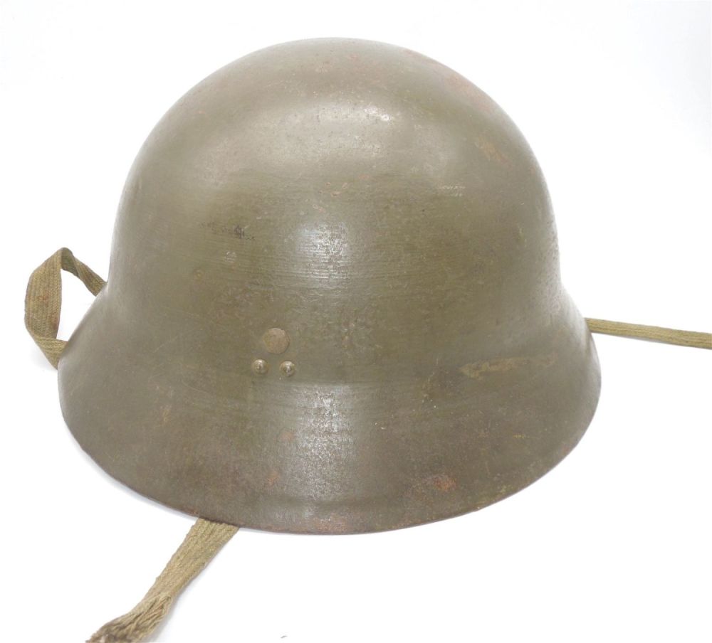 Lot 232: WWII Imperial Japanese Military Soldier Helmet & Liner