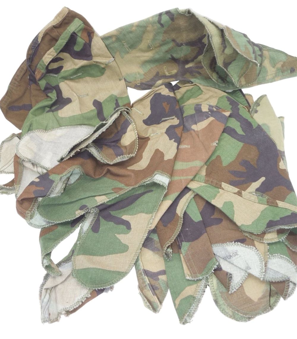 Lot 196: Lot (11) Cold War 1980s US Army M-1 Helmet Camouflage Covers