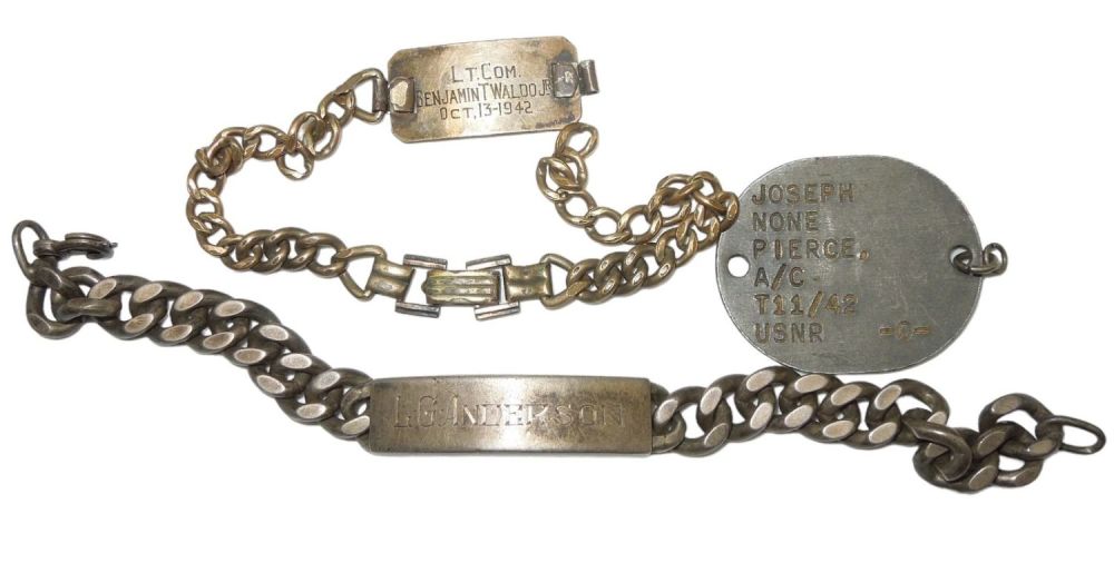 Lot 294: WWII Era ID Bracelets & Dog Tag Lot