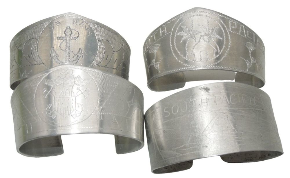 Lot 351: Lot (4) WWII Pacific Theater Made Trench Art Engraved Soldier Bracelets