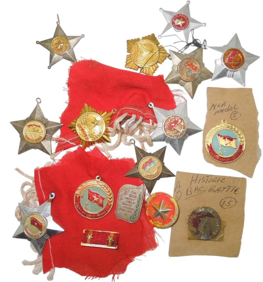 Lot 376: Vietnam War NVA North Vietnam Viet Cong Medals & Badges