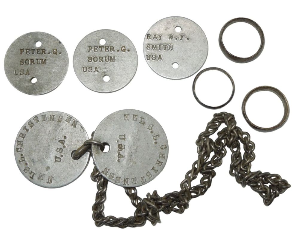 Lot 631: WWI Lot of Soldier Dog Tags & Trench Art Rings