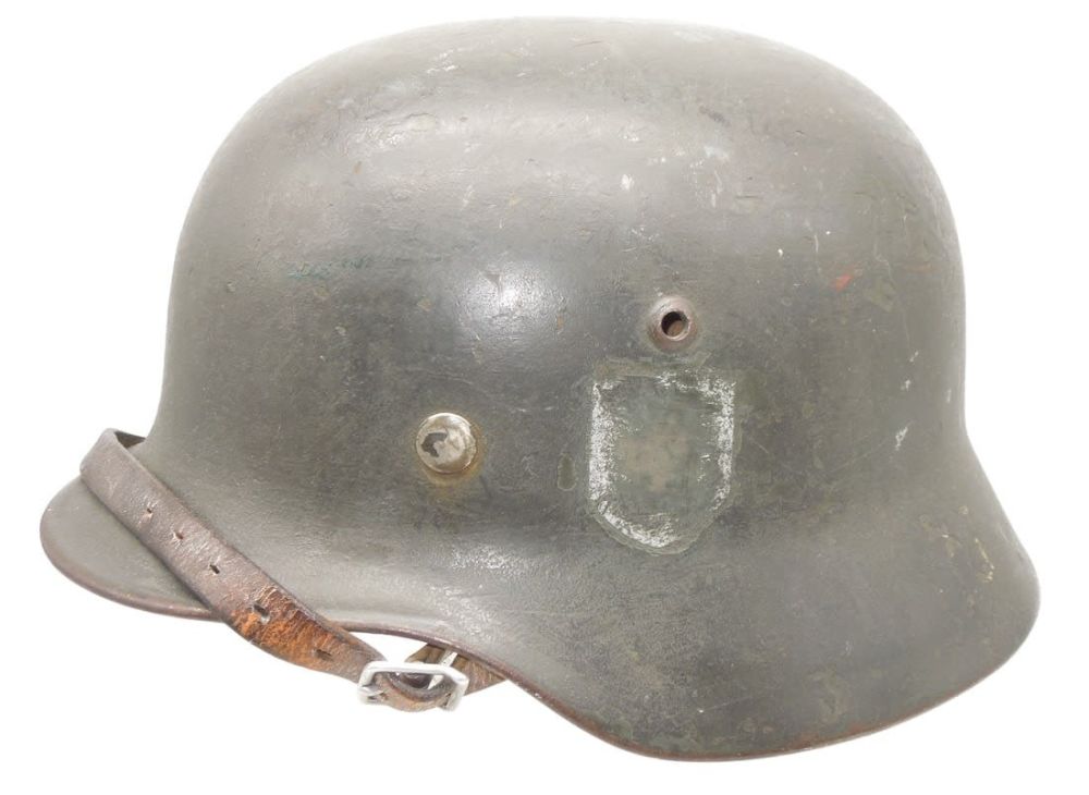 Lot 693: WWII German Wehrmacht M35 Helmet & Partial Decal