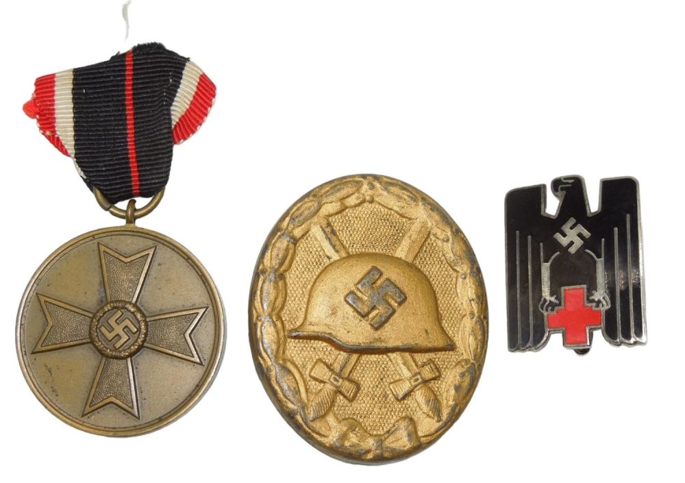 Lot 702: WWII German Wehrmacht War Merit Cross Gold Wound Badge & Red Cross Pin