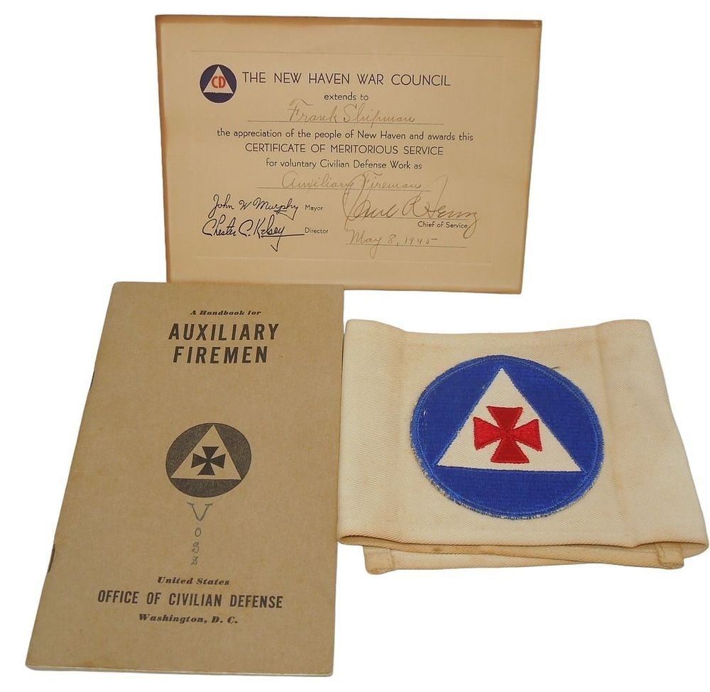 Lot 232: WWII New Haven Civil Defense Auxiliary Fireman Certificate, Armband & Booklet Lot
