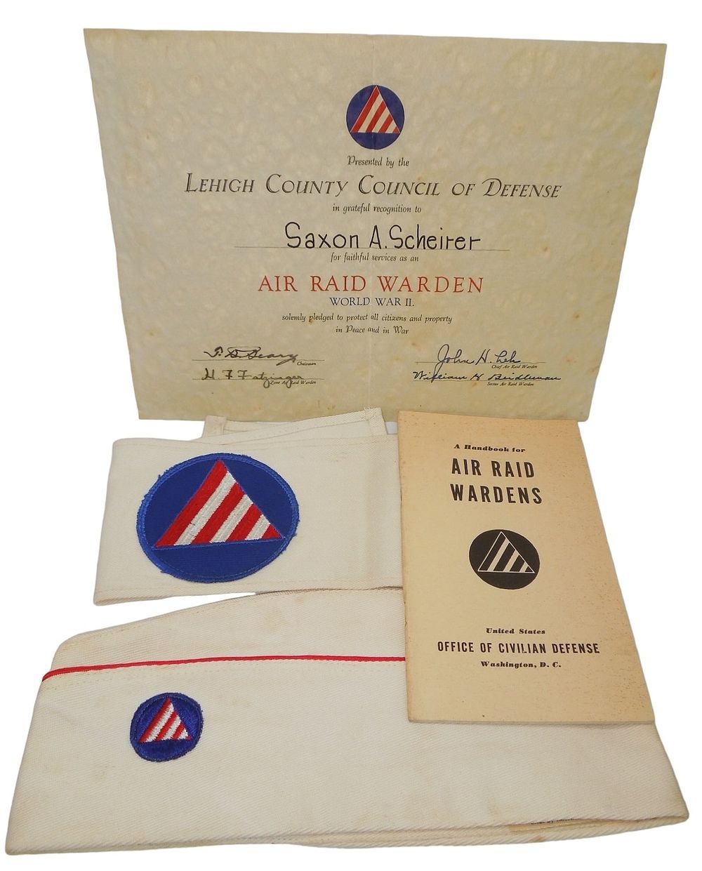 Lot 237: WWII Pennsylvania Civil Defense Air Raid Warden Certificate, Armband, Hat & Booklet Lot