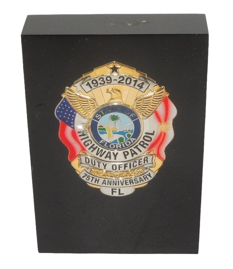 Lot 379: 2014 Florida Highway Patrol 75th Anniversary Duty Officer Police Badge in Lucite