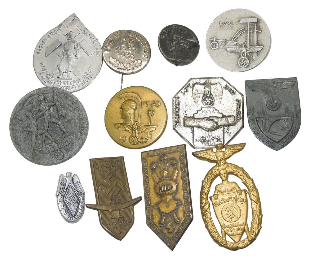Lot 427: Lot (12) WWII German Military NSDAP Tinnie Pins & Badges