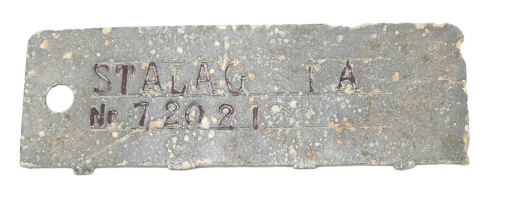 Lot 434: WWII German Stalag IA POW Camp ID Tag