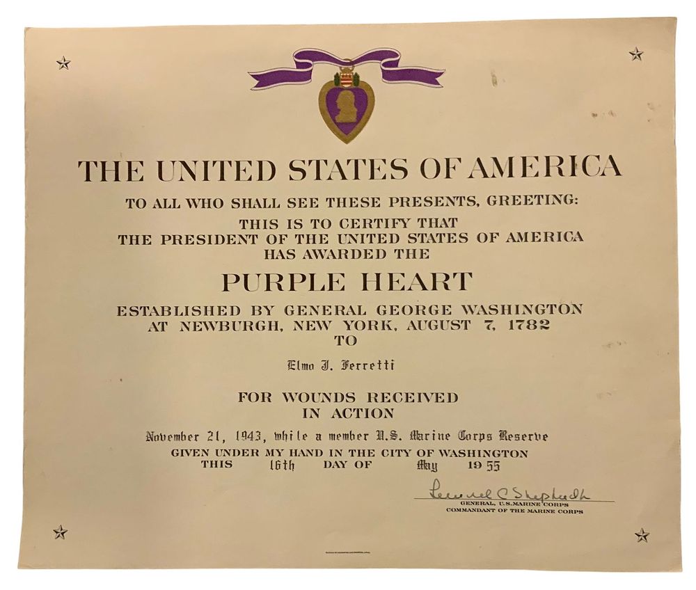 Lot 236: WWII USMC Marine Corps Elmo Ferretti 2nd Marine Division WIA Purple Heart Document