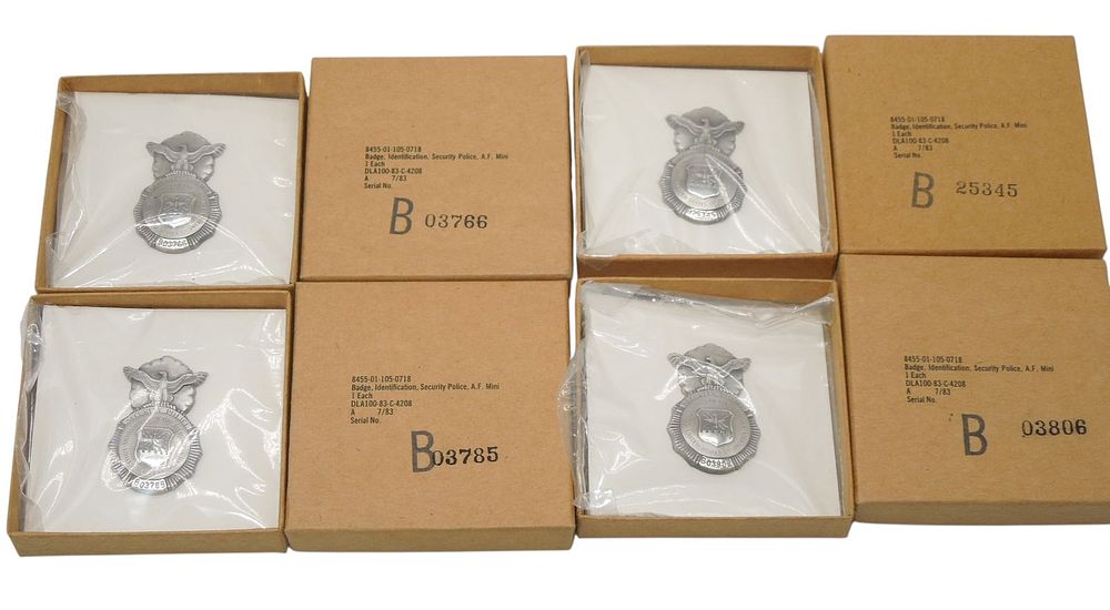 Lot 252: Lot (4) US Air Force 1983 Dated Numbered Mini USAF Security Police Badges in Boxes