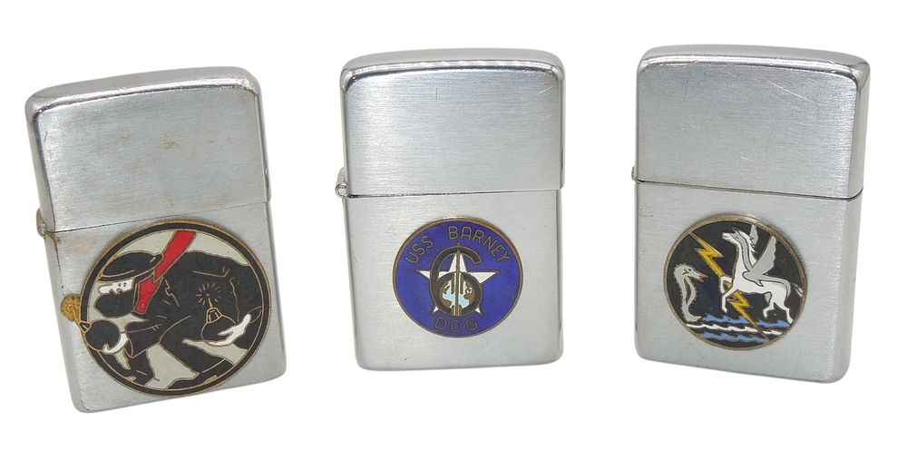 Lot 310: Lot (3) Vietnam War Zippo Lighters USS Barney 129th USAF Rescue Squadron