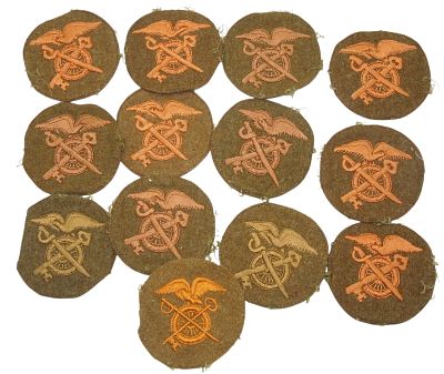 Lot (13) WWI US Army Quartermaster Corps Enlisted Uniform Patches. Original as shown. Condition: 
