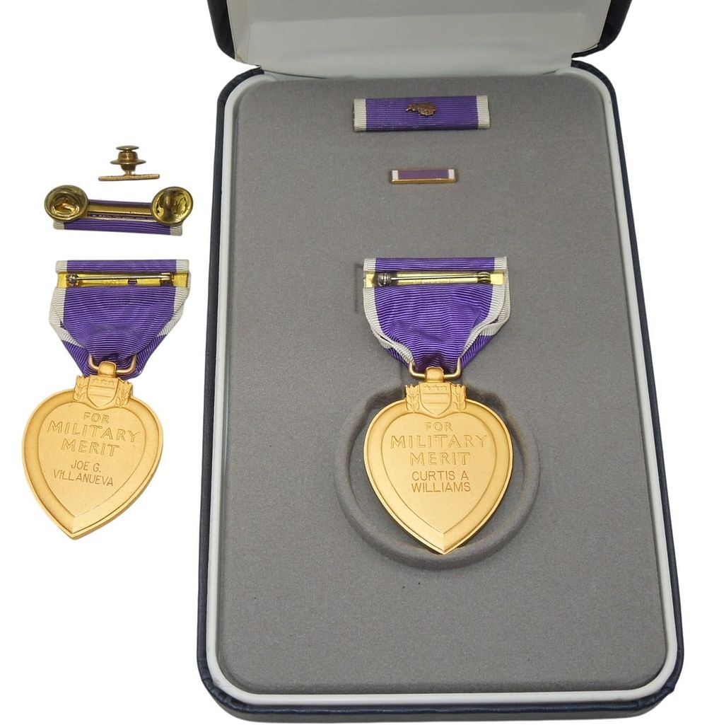 Lot 212: Korean War - Vietnam US Military Named Purple Heart Medals