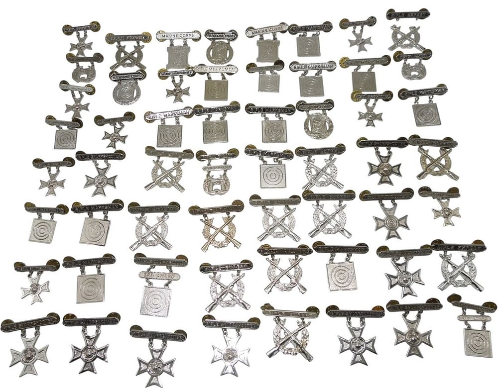 Lot 215: Vietnam War - Modern USMC Marine Corps Marksmanship Badges Pins