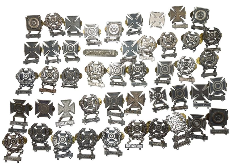 Lot 216: WWII - Cold War US Army Marksmanship Shooting Badges Pins