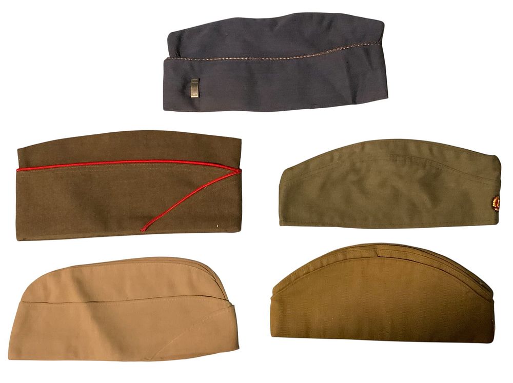 Lot 298: WWII - Later US Army / Air Force / Soviet Pilotka / East German Overseas Garrison Hats Artillery LOT