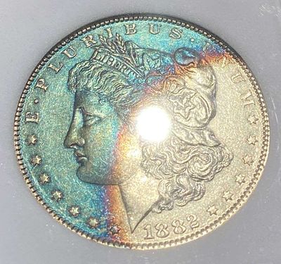 Monster Color 1882-O Morgan Silver Dollar MS64. IMPORTANT NOTE: We do not agree with the grade 