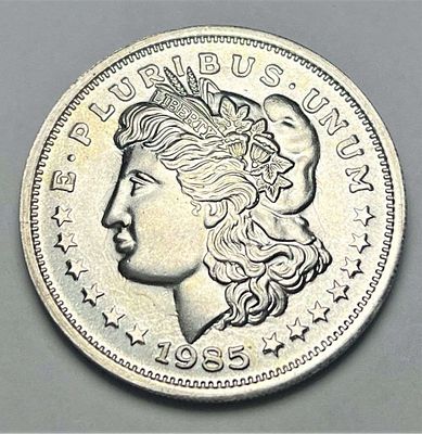 1985 Morgan Dollar Design 1 ozt .999 Silver Trade Unit. Winner shall receive the exact coin 