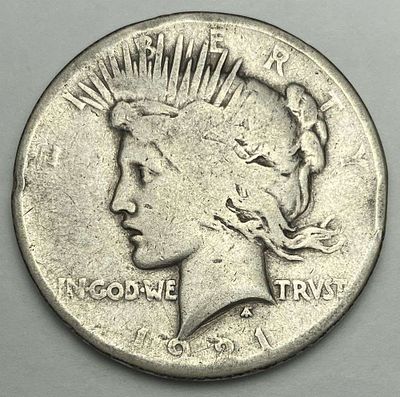 1921 Peace Silver Dollar VG. Winner shall receive the exact coin shown here. (RR/B)