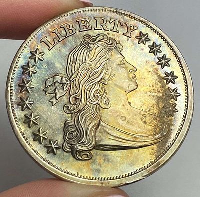 Toned Draped Bust Design 1 ozt .999 Silver. Winner shall receive the exact coin shown here. (RR)