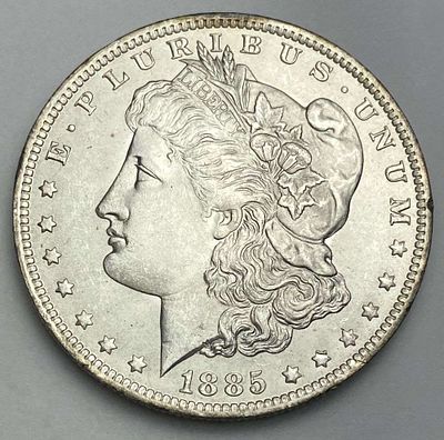 1885-O Morgan Silver Dollar MS64. Winner shall receive the exact coin shown here. (RR/B)