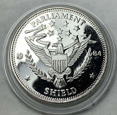 1984 Parliament Shield Proof 1 ozt .999 Silver. Winner shall recieve the exact coin shown here.