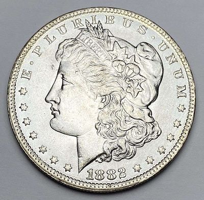 1882-O Morgan Silver Dollar MS65. Winner shall receive the exact coin shown here. (RR/PL)