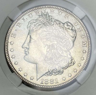 1881-O Morgan Silver Dollar MS65. IMPORTANT NOTE: We do not agree with the grade provided with