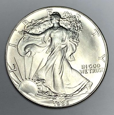 First Year 1986 American Silver Eagle. Winner shall receive the exact coin shown here. (MR/B)