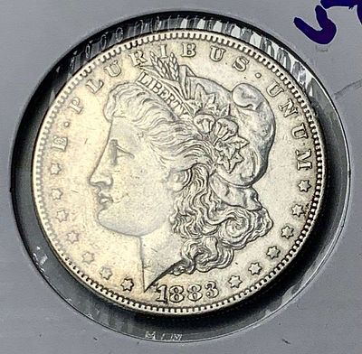 1883-S Morgan Silver Dollar AU50. Winner shall receive the exact coin shown here. (MK/B)
