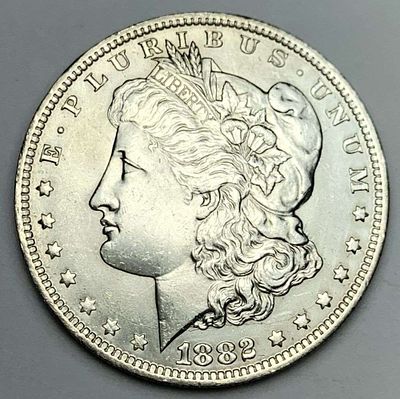 1882-O Morgan Silver Dollar MS63 Details. Winner shall receive the exact coin shown here. (MR/PB)