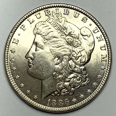 1886 Morgan Silver Dollar MS65. Winner shall receive the exact coin shown here. (MR/PB)