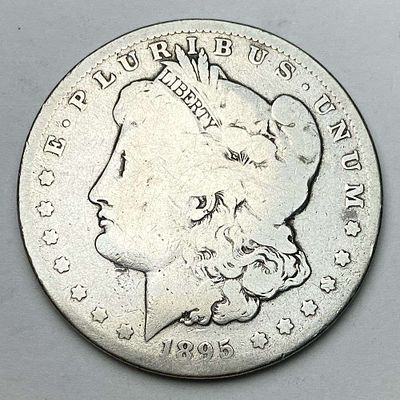 1895-O Morgan Silver Dollar Good. Winner shall receive the exact coin shown here. (RR)