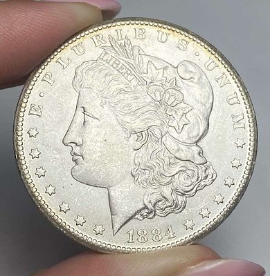 1884-CC Morgan Silver Dollar MS64. At the Longview, Washington coin show, we were honored to 