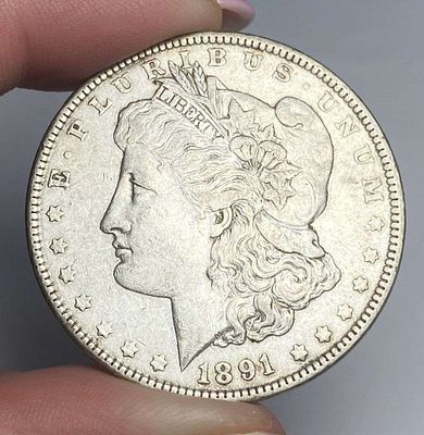 1891 Morgan Silver Dollar AU58 Details. At the Longview, Washington coin show, we were honored 