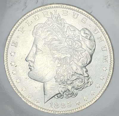 1885-O Morgan Silver Dollar NGC MS63. Winner shall receive the exact coin shown here. (MR/PB)